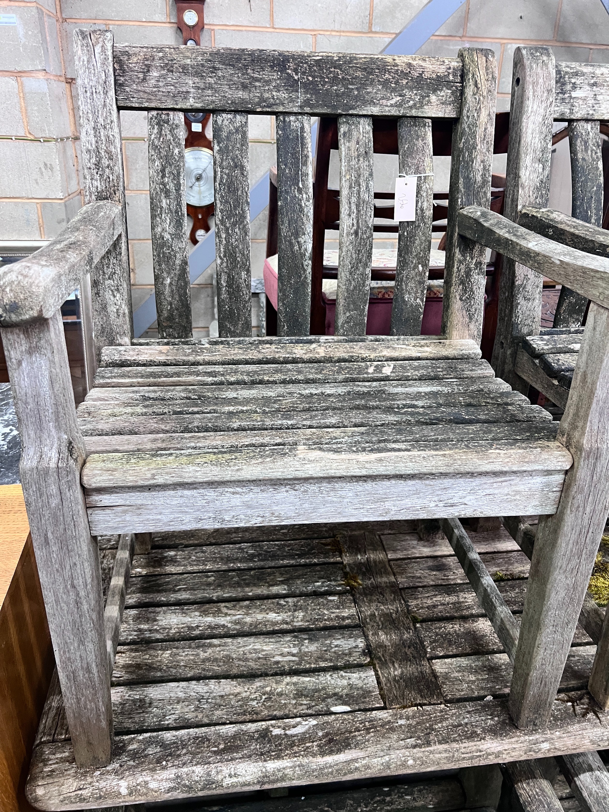 An Alexander Rose weathered teak rectangular garden table with a set of five matching armchairs, table length 161cm *Please note the sale commences at 9am.